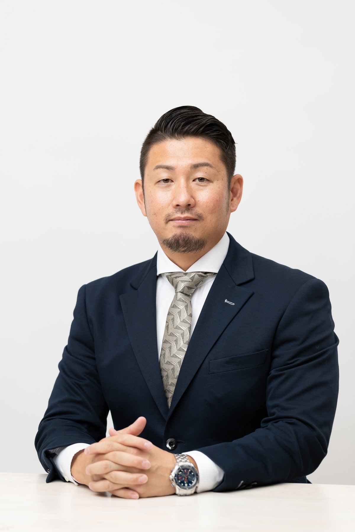 三心グループ代表 三反田 悟